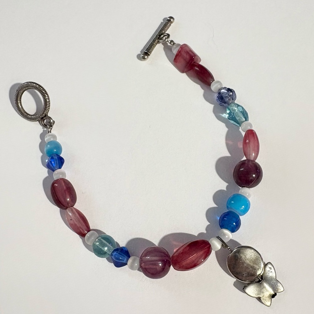 Artisan Multicolored Beaded Bracelet With Butterfly Charm